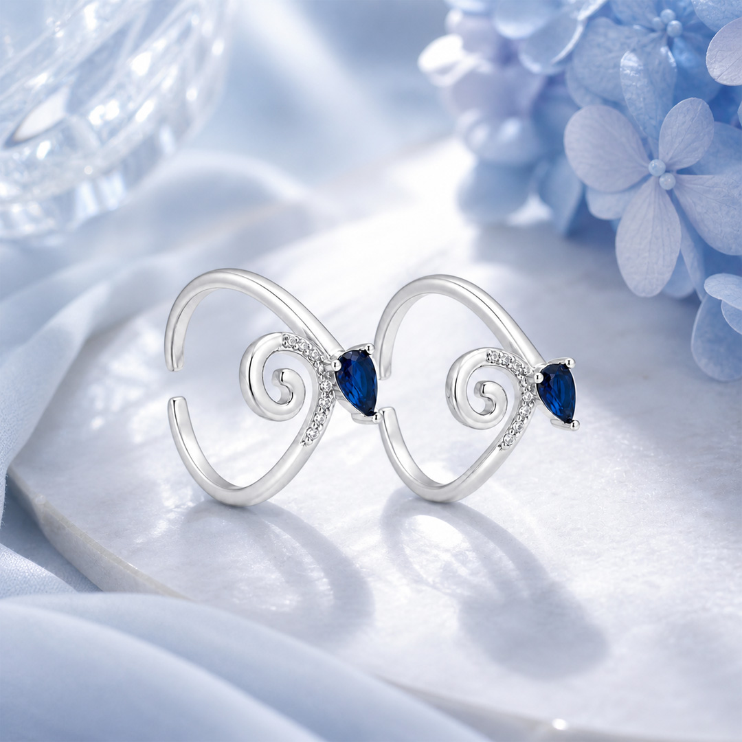 Vintage Swirl Pear-Cut Sapphire Blue Crystal Open Cuff Ring in Sterling Silver