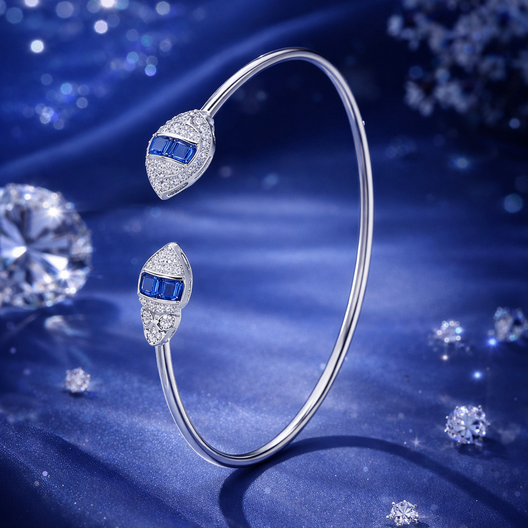 White Gold Pear Shape Sapphire and Diamond Open Bangle